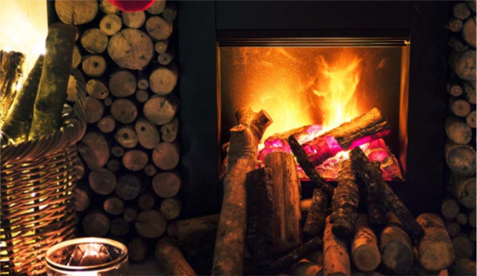 lit fireplace burning wood