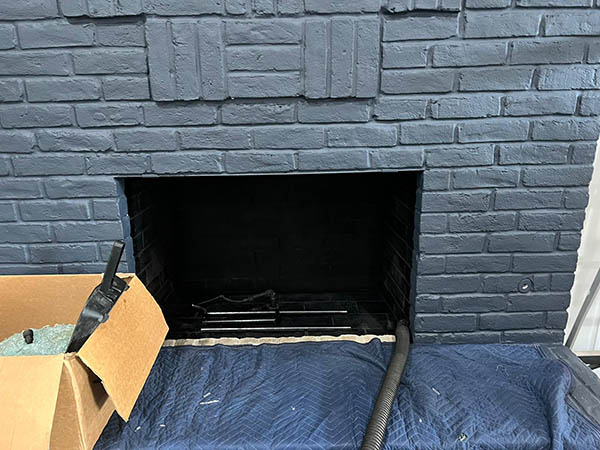 brick fireplace painted gray