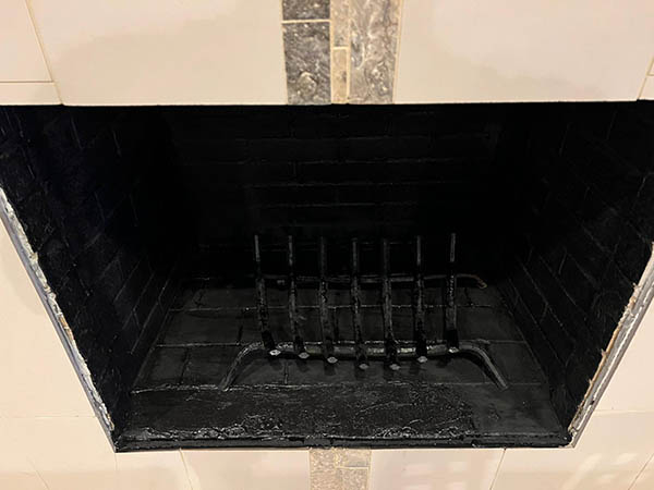 firebox with black fireplace grate
